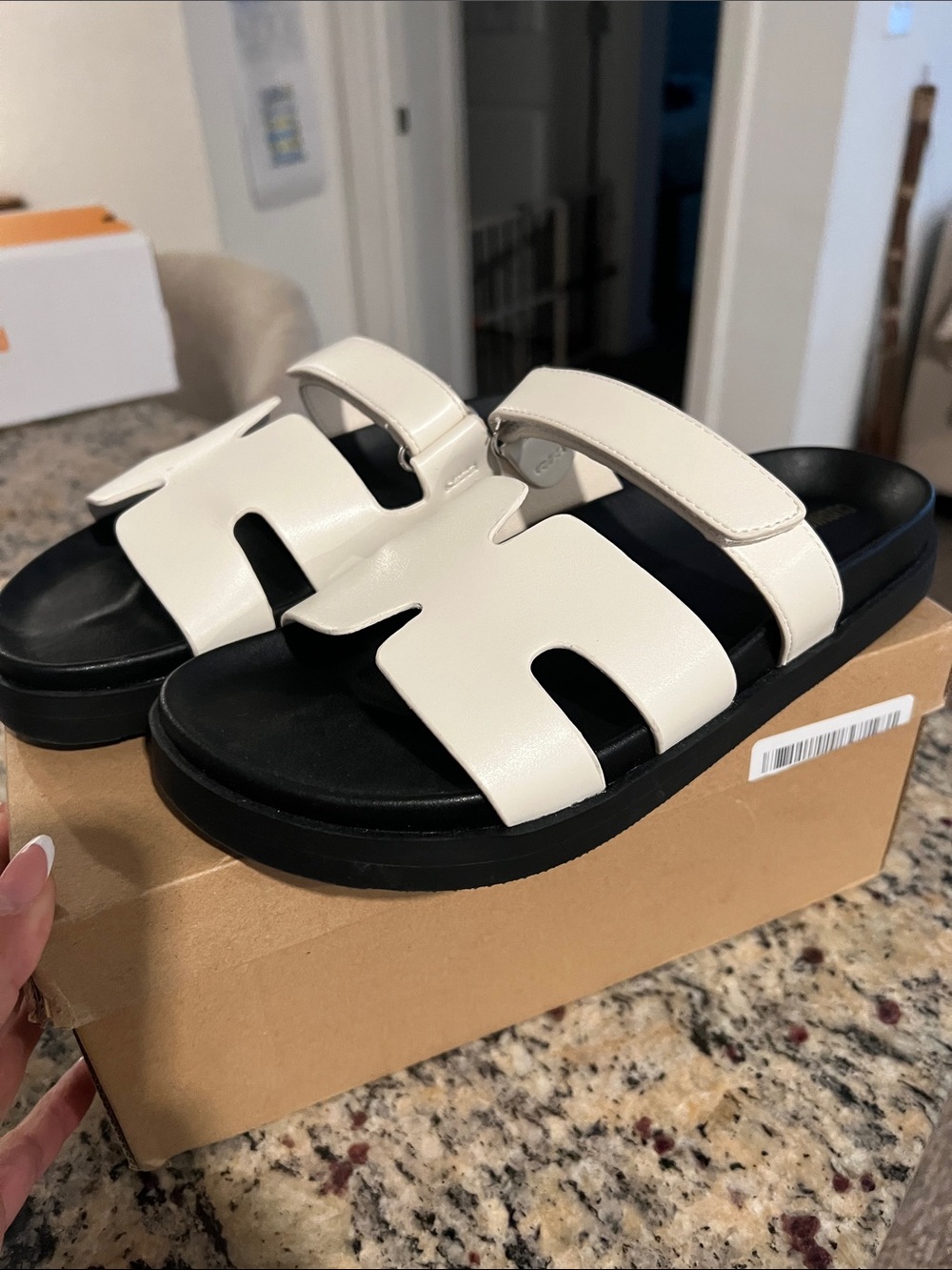 Women's White Slide Sandals with Black Footbed and Adjustable Strap